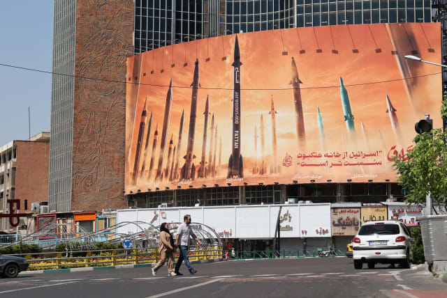  An anti-Israel billboard with a picture of Iranian missiles is seen on a street in Tehran, Iran April 19, 2024. (photo credit: MAJID ASGARIPOUR/WANA (WEST ASIA NEWS AGENCY) VIA REUTERS)