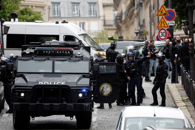 French police at the scene of the Iranian consulate, April 19, 2024 (photo credit: REUTERS/BENOIT TESSIER)