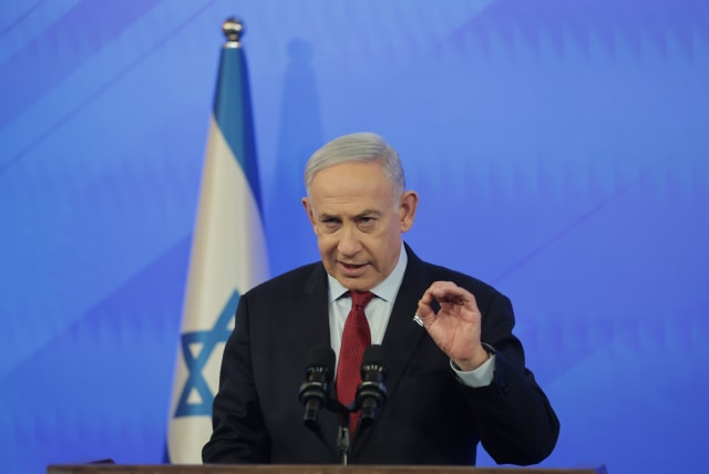  Israeli prime minister Benjamin Netanyahu holds a press conference at the Ministry of Defense in Tel Aviv on February 29, 2024.  (photo credit: NIMROD KLIKMAN/POOL)