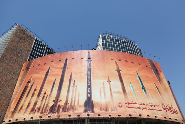  An anti-Israel billboard with a picture of Iranian missiles is seen on a street in Tehran, Iran April 19, 2024. (photo credit: MAJID ASGARIPOUR/WANA (WEST ASIA NEWS AGENCY) VIA REUTERS)