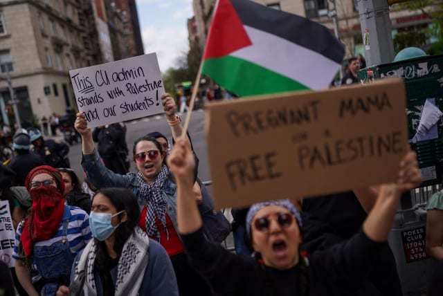  Demonstrators gather outside of Columbia University to demand a ceasefire and the end of Israeli attacks on Gaza, during the ongoing conflict between Israel and the Palestinian Islamist group Hamas, during a protest in New York, U.S., April 20, 2024.  (photo credit: Reuters/Adam Gray)