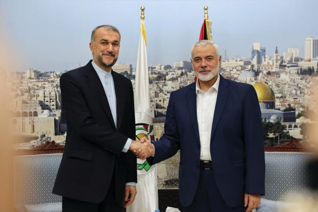  IRAN’S FOREIGN Minister Hossein Amirabdollahian and Hamas leader Ismail Haniyeh meet in Doha in December 2023. (photo credit: Iran’s Foreign Ministry/West Asia News Agency/Reuters)