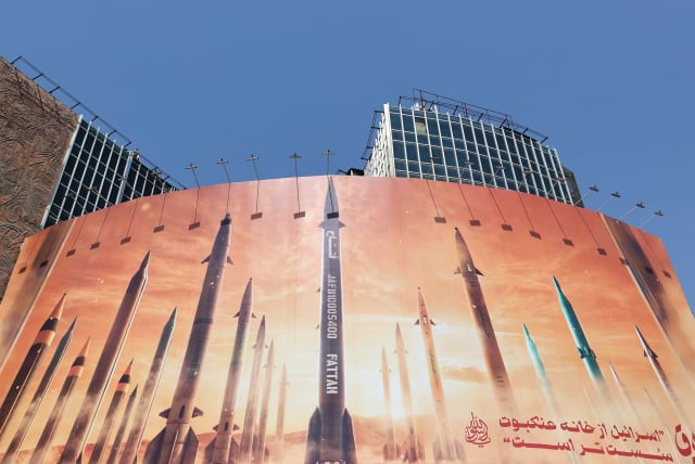  AN ANTI-ISRAEL billboard with a picture of Iranian missiles is seen on a street in Tehran last week. When Iran fired over 300 projectiles at us, it seemed like the region could be heading toward World War III, says the writer. (photo credit: Majid Asgaripour/WANA via Reuters)