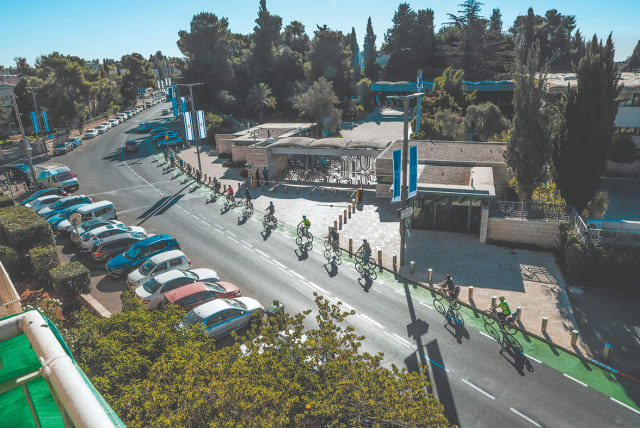  Cyclists are seen on the bicycle path on Hanassi Street in Jerusalem. (photo credit: Shlomit Wolf)