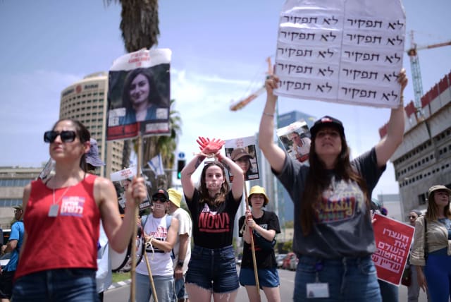  Relatives of Israelis held hostage in the Gaza Strip and supporters protest calling for their release outside Hakirya Base in Tel Aviv, April 25, 2024. (photo credit: TOMER NEUBERG/FLASH90)