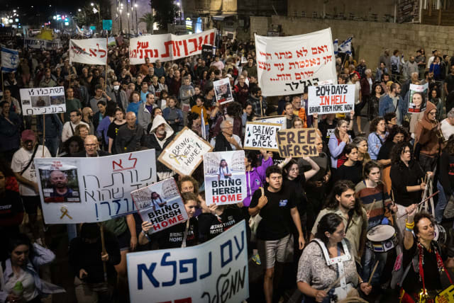 Demonstrators protest for the release of Israeli hostages held hostage by Hamas terrorists in the Gaza Strip, in Jerusalem. April 27, 2024.  (photo credit: Chaim Goldberg/Flash90)