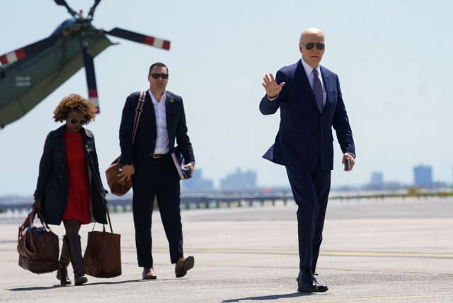  US President Joe Biden waves as he walks to board Air Force One to return to Washington from JFK Airport in New York City, US, April 26, 2024. (photo credit: REUTERS/KEVIN LAMARQUE)