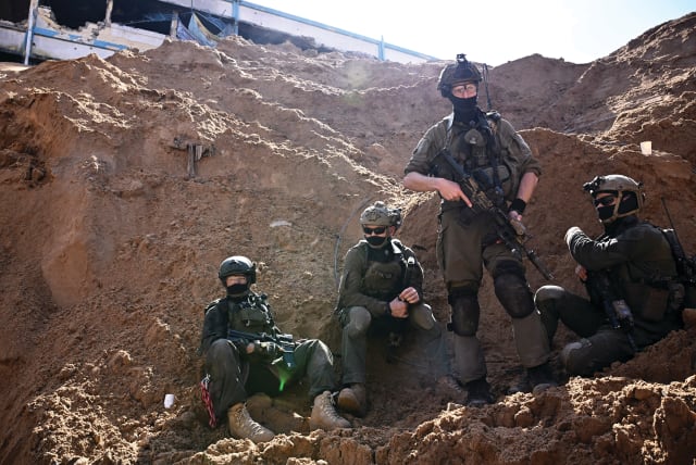  IDF SOLDIERS operate near what the military described as a Hamas command tunnel running partly under UNRWA headquarters, in the Gaza Strip, in February. In spite of the remarkable achievements of the IDF in Gaza, the war lingers on with no clear end in sight, the writer laments. (photo credit: DYLAN MARTINEZ/REUTERS)