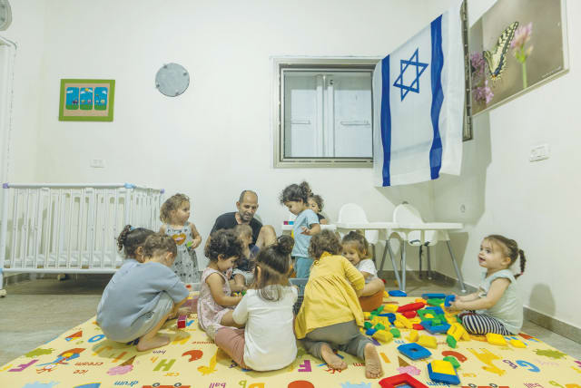  CHILDREN PLAY in a pre-school group set up inside a bomb shelter, in the center of the country, in November. Our children have lost their innocence, and have had to grapple with concepts that most adults can barely understand, the writer laments. (photo credit: YOSSI ALONI/FLASH90)