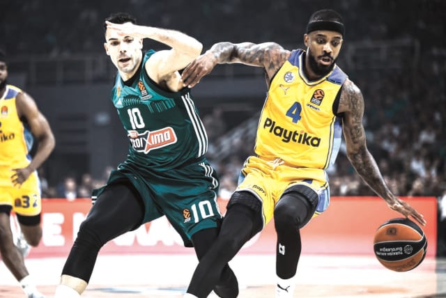  LORENZO BROWN (right) and Maccabi Tel Aviv fought valiantly, but came up just short to Kostas Sloukas (left) and Panathinaikos, falling 81-72 in Athens late Tuesday night in the decisive Game 5 of their Euroleague quarterfinal series. (photo credit: Dimitropoulos/Tourette Photography)