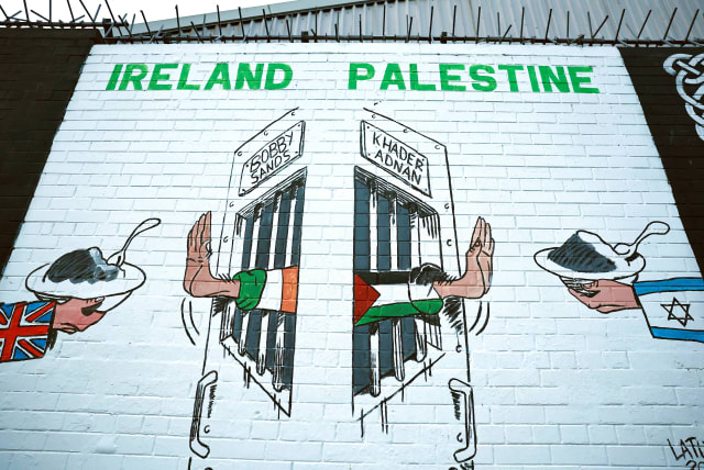  A view of a mural in solidarity with Palestinians in Gaza, amid the ongoing conflict between Israel and Hamas, in the Nationalist area along the International Wall on the Falls Road in Belfast, Northern Ireland, November 4, 2023 (photo credit: Clodagh Kilcoyn/Reuters)