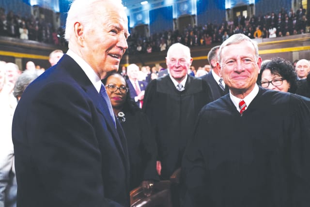  US PRESIDENT Joe Biden greets Supreme Court Chief Justice John Roberts before the president’s State of the Union address, in March. (photo credit: Shawn Thew/Reuters)