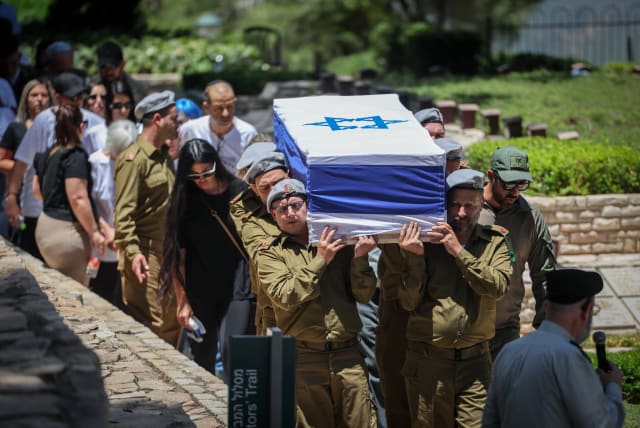  Sgt. Maj. (res.) Eliran Mizrahi's funeral at the Mount Herzl Military Cemetery in Jerusalem on June 13, 2024 (photo credit: YONATAN SINDEL/FLASH90)
