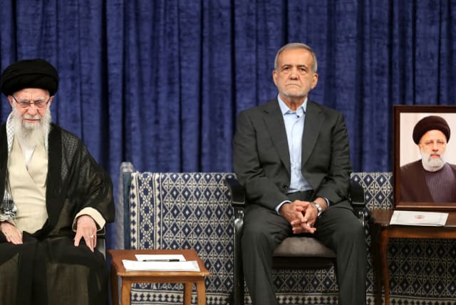  Iran's Supreme Leader Ayatollah Ali Khamenei and Iran's new president, Masoud Pezeshkian, attend an endorsement ceremony in Tehran, Iran, July 28, 2024.  (photo credit: Office of the Iranian Supreme Leader/WANA (West Asia News Agency)/Handout via REUTERS)