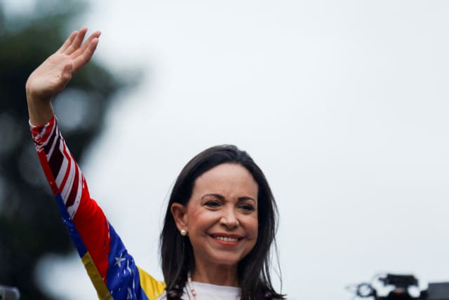  Venezuelan opposition leader Maria Corina Machado gestures during a presidential election campaign closing rally in Caracas, Venezuela, July 25, 2024.