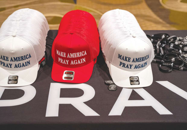  HATS WITH the slogan ‘Make America Pray Again’ are displayed at the National Religious Broadcasters Association International Christian Media Convention, addressed by Donald Trump, in Nashville, in February.