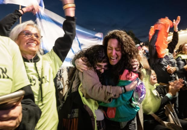  Israelis celebrate as the hostages are brought back on the first day of the Israel-Hamas ceasefire.