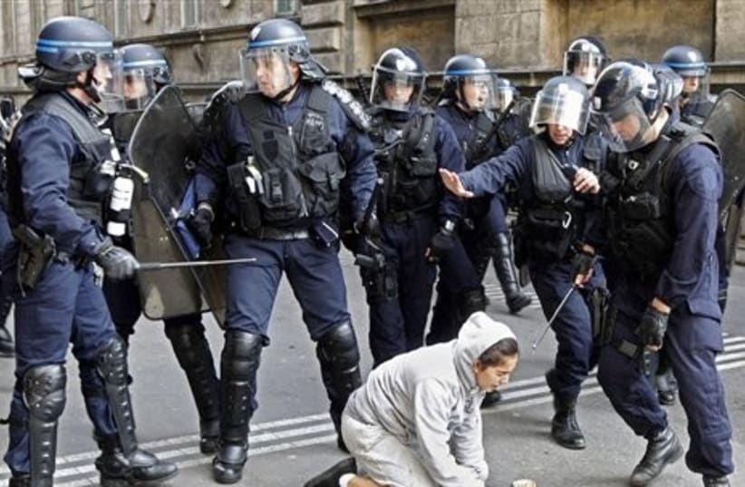 Girl surrounded by cops french strikes - Gallery