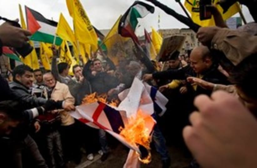 Palestinian burn Al Jazeera flags 311