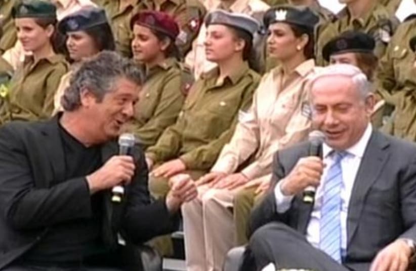 Netanyahu at ceremony laughing 