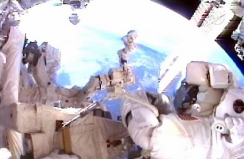 Astronaut working during a spacewalk GALLERY