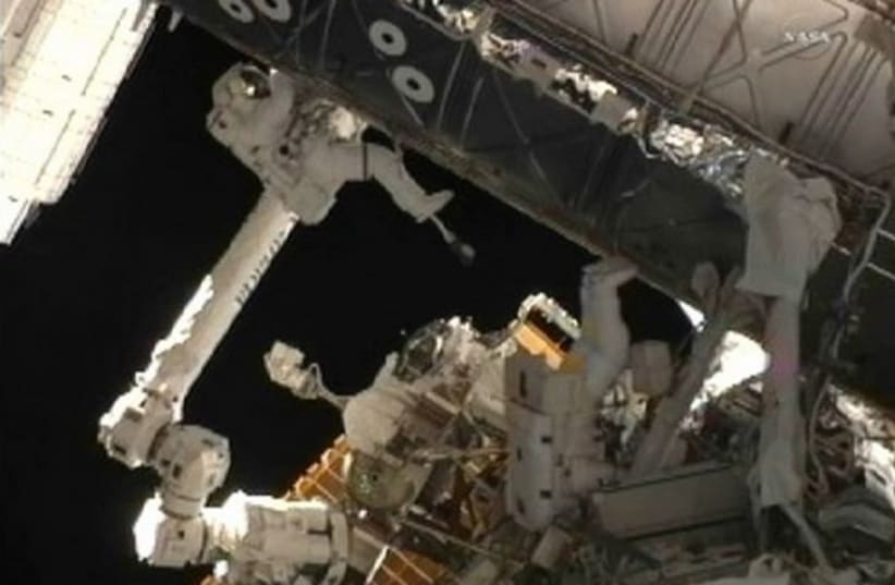 Astronaut working during a spacewalk GALLERY