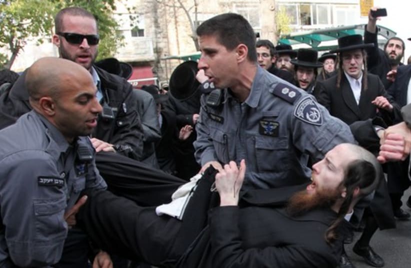 Haredi man is arrested at protest in Mea Shearim