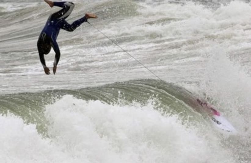 Tel Aviv surfer rides winter waves