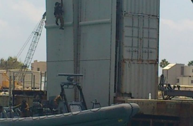 Navy commandos from Flotilla 13 practice boarding a ship