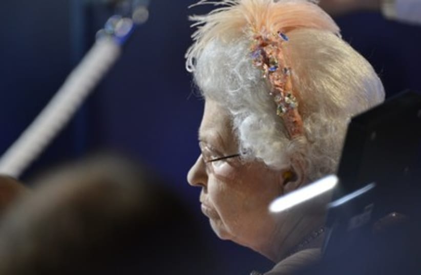 Queen Elizabeth watches Olympic opening ceremony