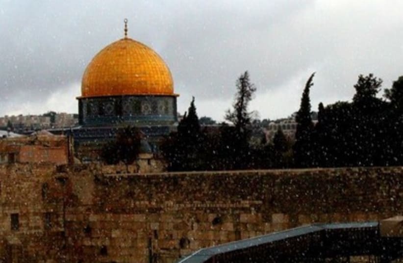 Snow falls in Jerusalem's Old City at the Western Wall 390 