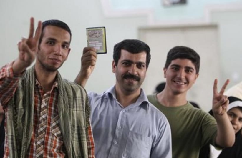 iranian election men voting 390