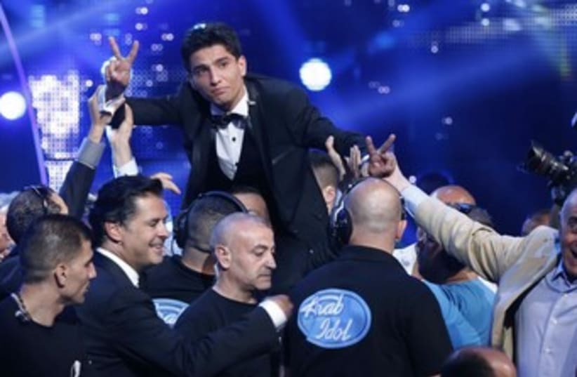 Mohammed Assaf celebrates after Arab Idol win370