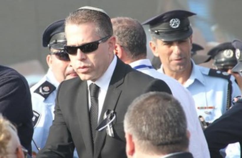 Likud Minister Gilad Erdan at Ariel Sharon's funeral, January 13, 2014.