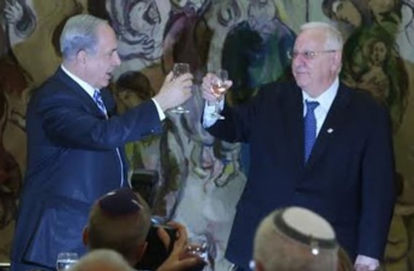 Reuven Rivlin and Benjamin Netanyahu raising a toast