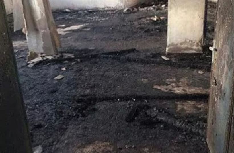 The mosque set on fire in Al-Maghir, east of Ramallah.‏