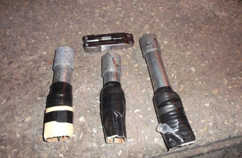 The makeshift pipe bombs found in a car in Abu Dis, ready for use.