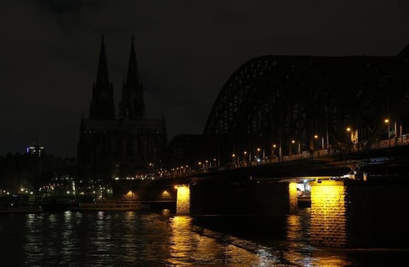 Picture shows the famous Cologne Cathedral as its illumination is switched off in a protest against a march by the growing grass-roots anti-Muslim movement