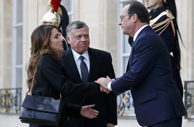 French President Francois Hollande welcomes Jordan's King Abdullah and his wife Queen Rania at the Elysee Palace.