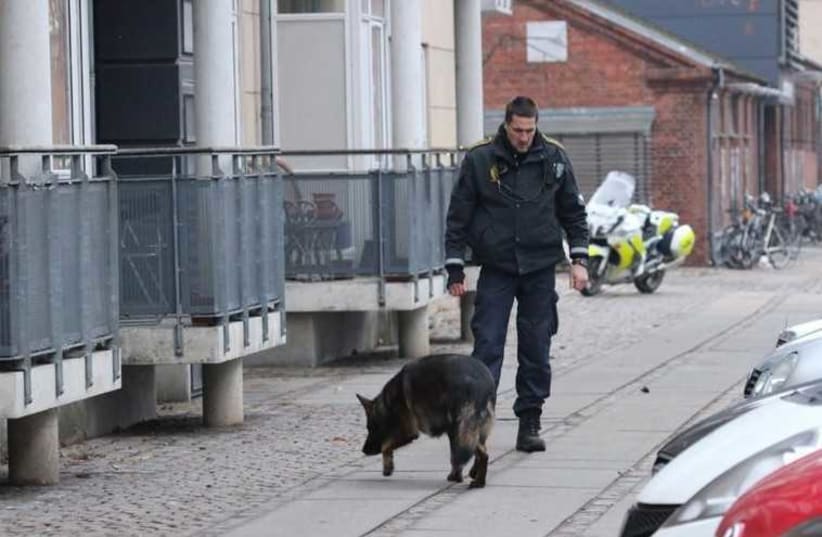 Police presence is seen at the site of a shooting in Copenhagen