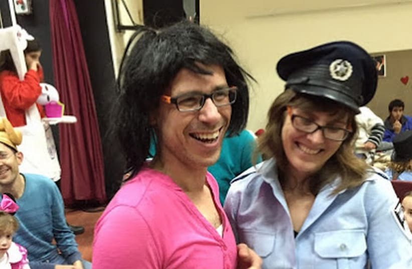 A Policeman and a ''sexually harassed women'' purim costumes