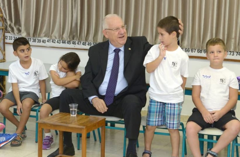 President Rivlin with first grade students in Ashdod
