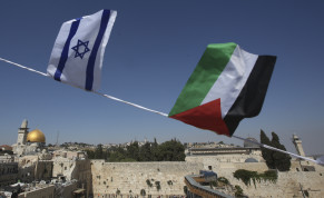 Palestinian and Israeli flags overlook Dome of Rock and Western Wall