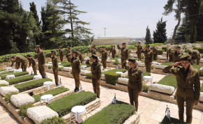  IDF soldiers place flags at graves on Mount Herzl ahead of Memorial Day, May, 2022